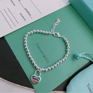 Tiffany & Co. Silver Beaded Heart Lock Charm Bracelet